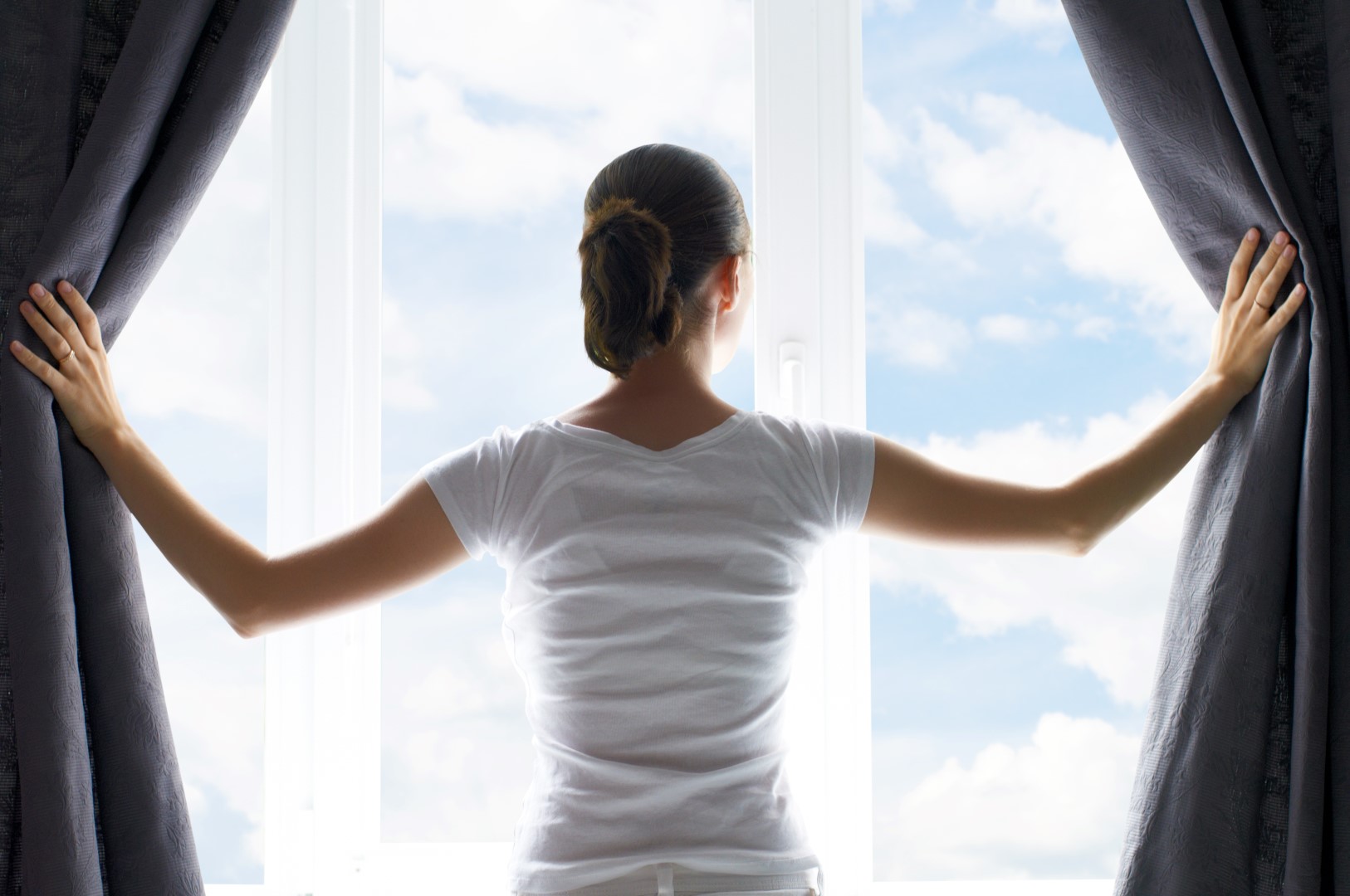 Woman stares out the window